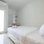 Minimalist Studio Room At The Springlake Apartment Sumarecon Bekasi By Travelio
