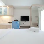 Minimalist Studio Room At The Springlake Apartment Sumarecon Bekasi By Travelio