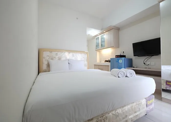Minimalist Studio Room At The Springlake Apartment Sumarecon Bekasi By Travelio